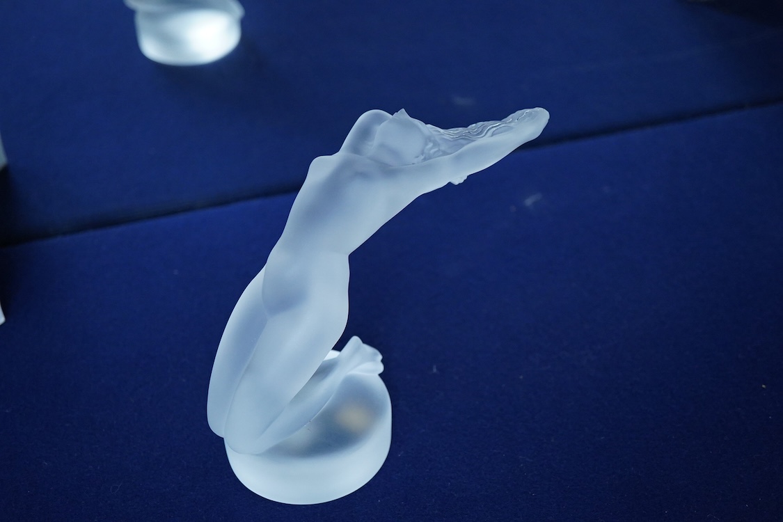 A Lalique frosted glass paperweight of Chrysis, kneeling female nude, 15cm high